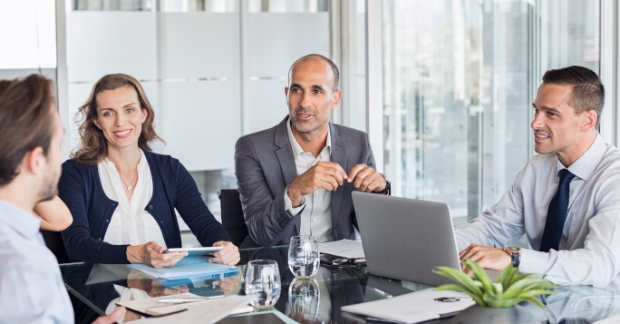 B2B coworkers strategizing about business