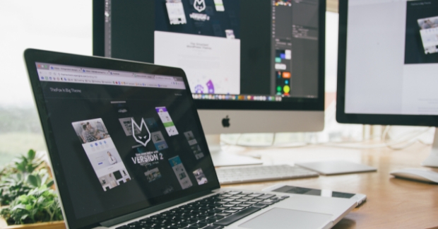 Laptop showcasing graphic design trends