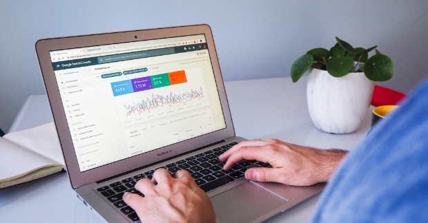 Person looking at SEO rankings on a laptop