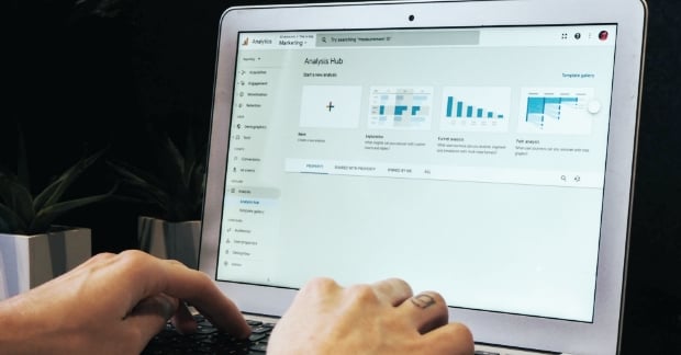 Person looking at Google analytics screen on laptop