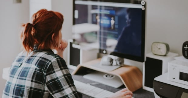 Woman working remotely at desk