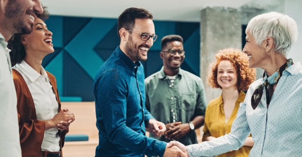 Client shaking hands with marketing agency partner