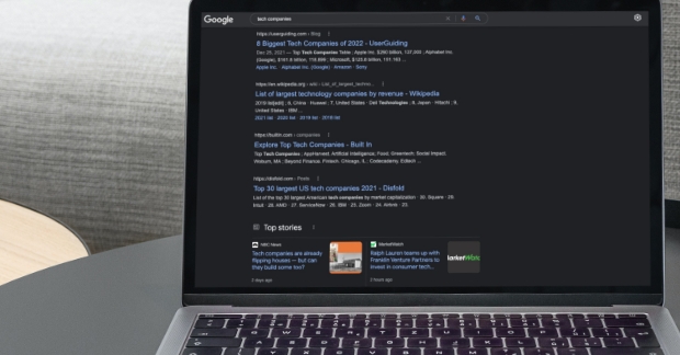 Google search results shown on laptop
